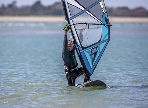 STRETCHING the POINT Flexibility for the average windsurfer, or lack of it, has the greatest influence during the waterstart.  The more they can bend their legs, the more compact they can make themselves, the higher they can throw their shoulders and the more they can bend at the waist, the more power they produce and the smaller their arc of movement. Here’s the bad news. To a large extent it’s genetic. You can stretch to maintain flexibility, but if you’re trying to increase it, you have a job on your hands. When you stretch and appear to be getting more limber, you’re actually just developing a tolerance for the discomfort. In order to change the structure of the tissue you’d have to train for hours every day for months (some yogis do just that). For most sports the experts say that stretching is over-rated. It’s possible to be too supple to the point where the joints become unstable. And recent studies have revealed that static stretching before the activity actually weakens the muscle. Most people are flexible enough for what they want to do.  Photos Dave White