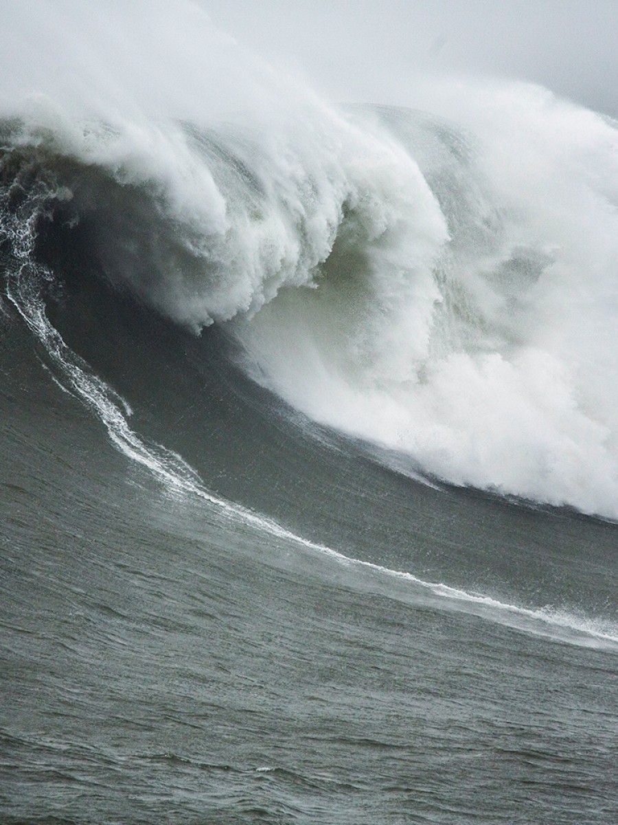 Jason Polakow windsurfs huge Nazare, Portugal on Februar 02, 2016