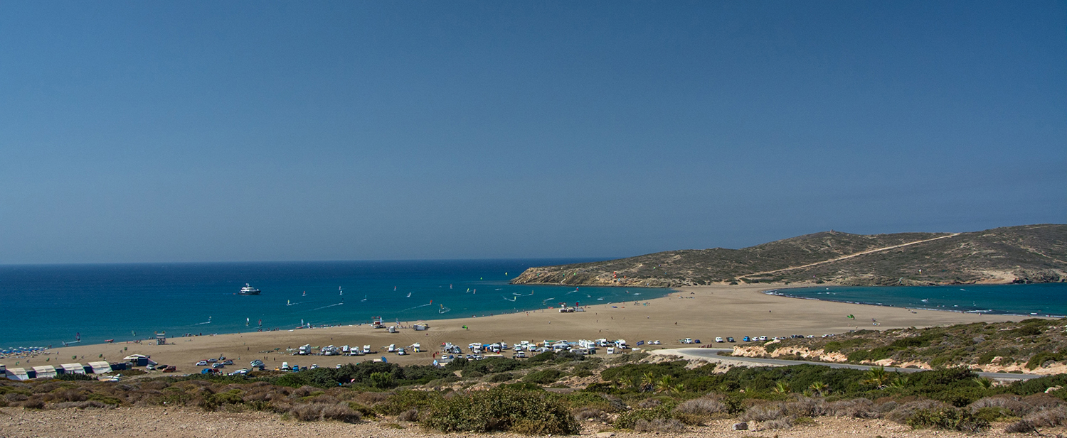 Click to Enlarge - The view of Prasonisi from behind Procenter Christof Kirschner (bottom left). To the right is the wave beach and to the left the flat water bay, with separate windsurfing and kitesurfing zones.