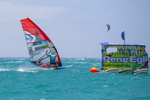 Click to Enlarge - Matteo celebrating victory in Sotavento. Photo John Carter.