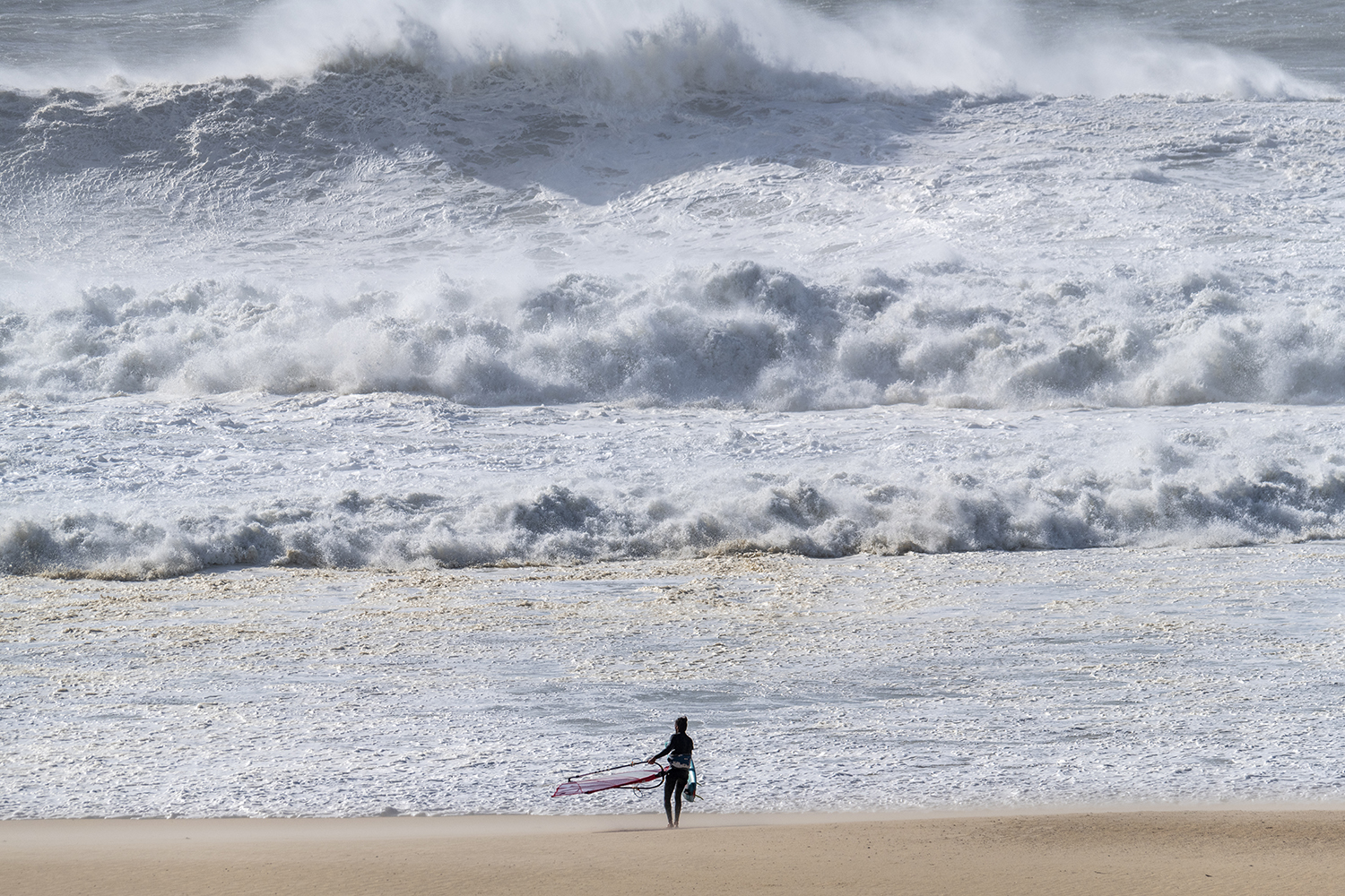 Thomas heading out at Nazare!