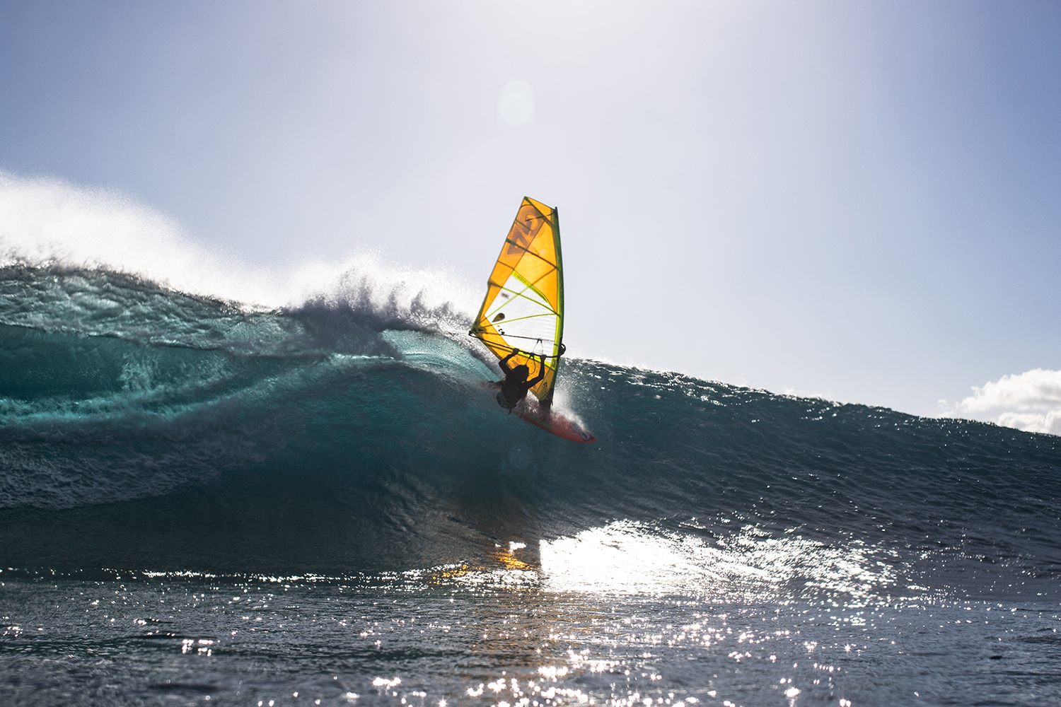 Thomas carving on a sublime wave