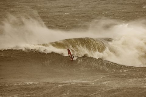 Red dusr in the air turns the atmosphere at Nazare very surreal!