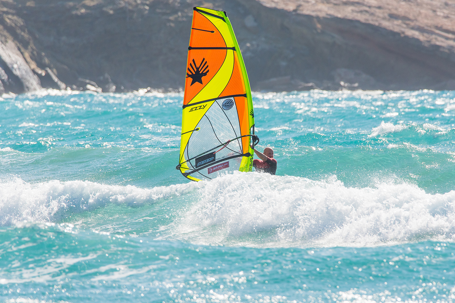 Choose a nice wall and come away from the wave with your hands together, body low and out as you look to where you will be turning.