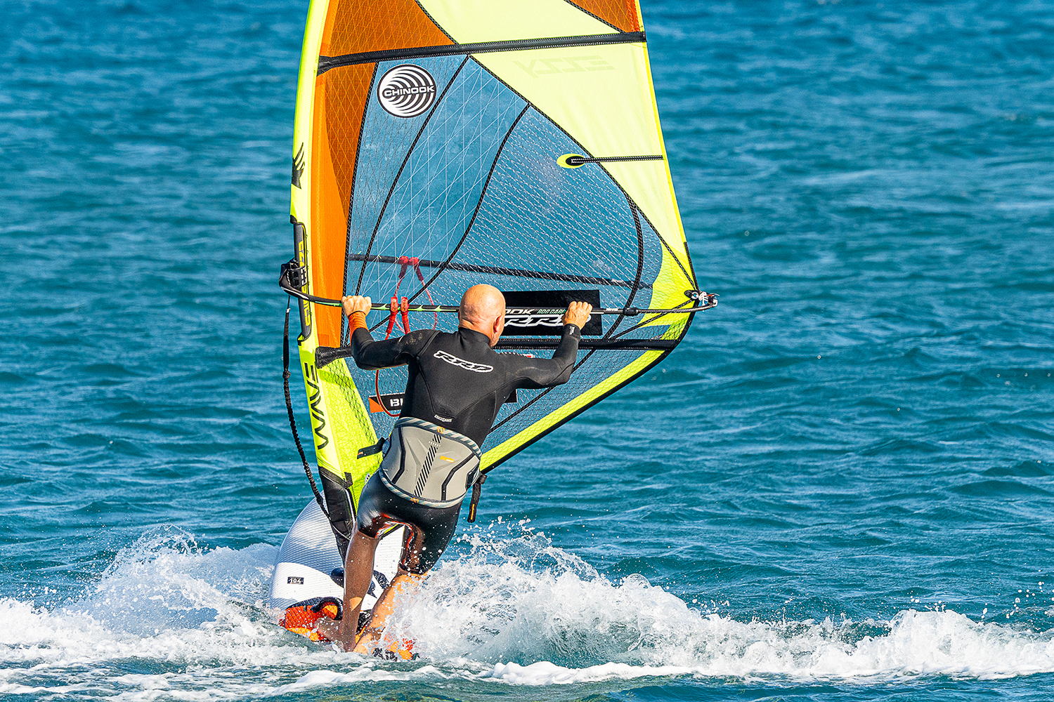 Step the new front foot up to the mastfoot and face it forward. Keep seeing the clew and open up the mast hand so the sail can breathe and start to pull you forward.