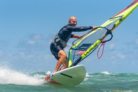 Extending your front arm into the carve gybe will often see a bent back leg following and both will smooth your turns.