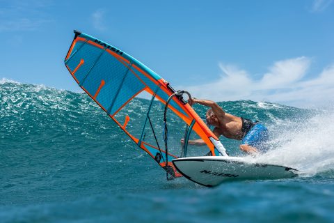 Michi Schweiger cranking a bottom turn in Maui