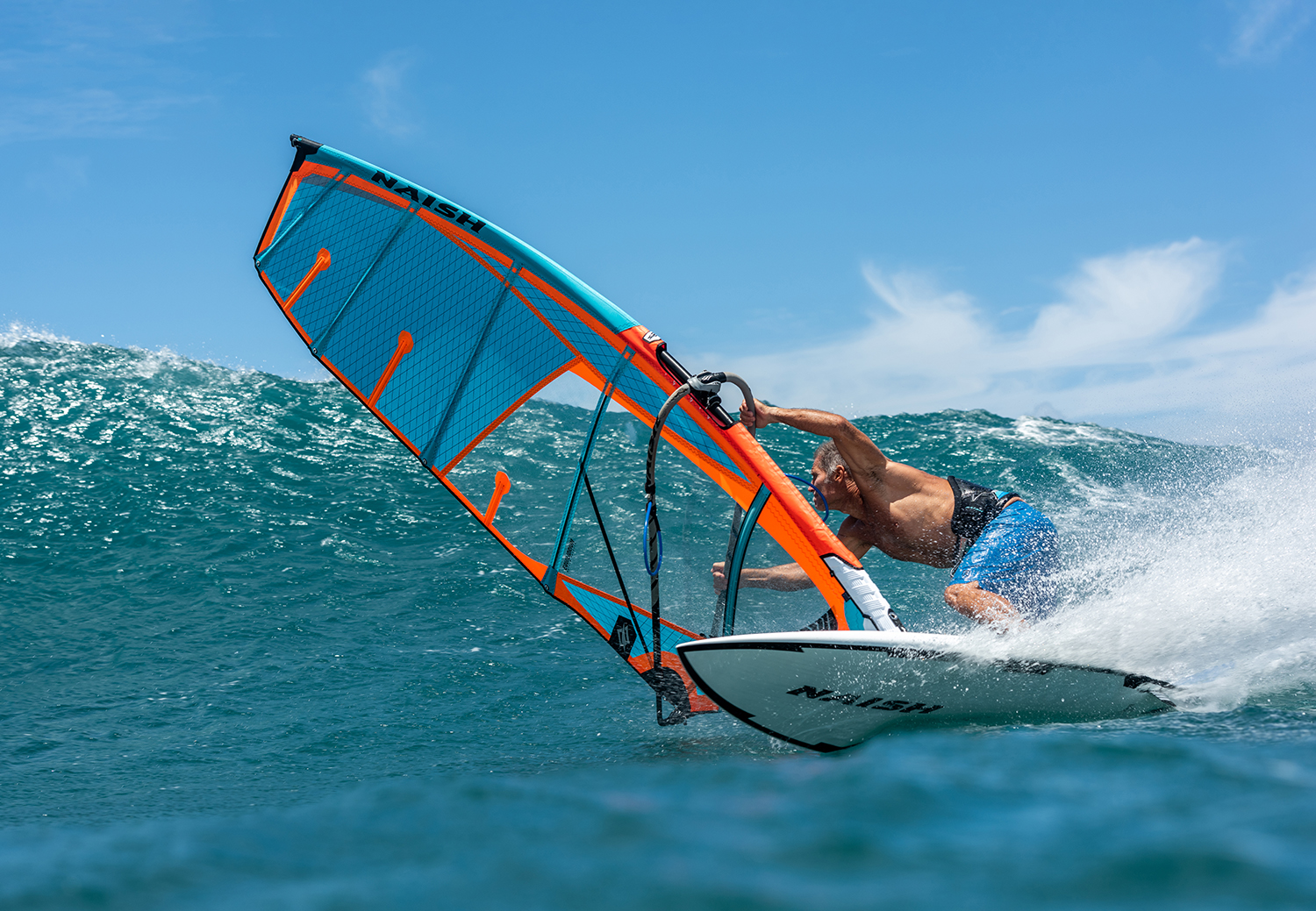 Michi Schweiger cranking a bottom turn in Maui