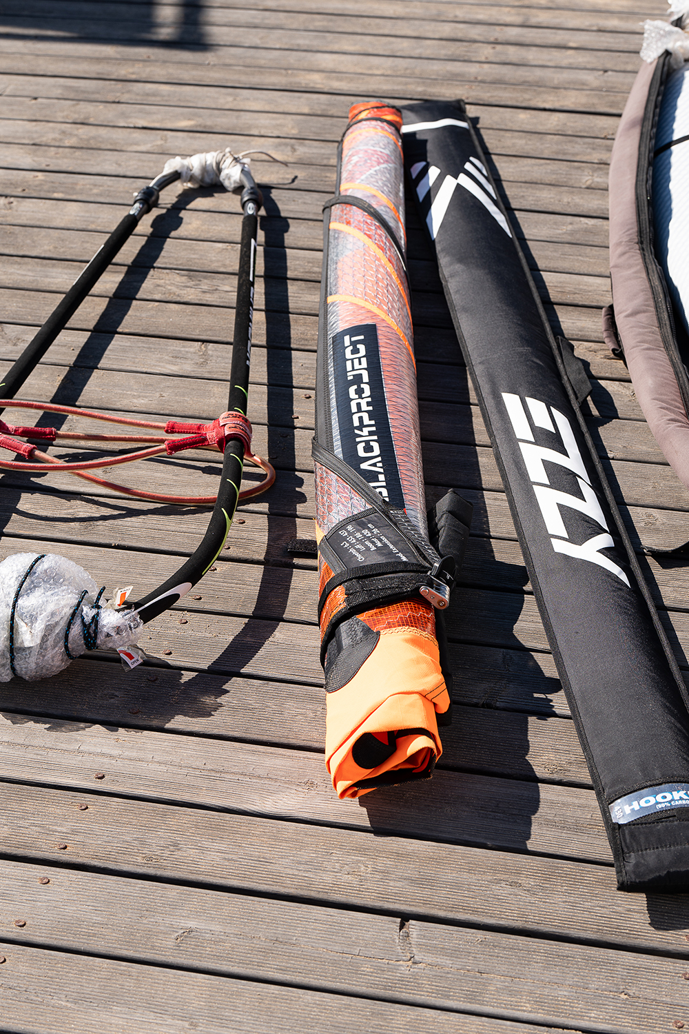 ‘Boom with foam protection, sail rolled tight, mast in padded bag, all ready to pack.’