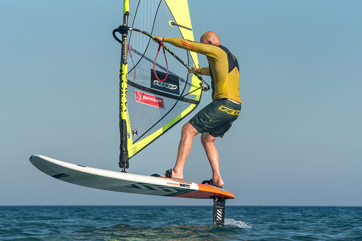 Bottom turn: Get the rig forward and open, as you scissor and then carve. Getting comfy at this will boost your foil gybe entrances, and your ability to control and maintain ride height.