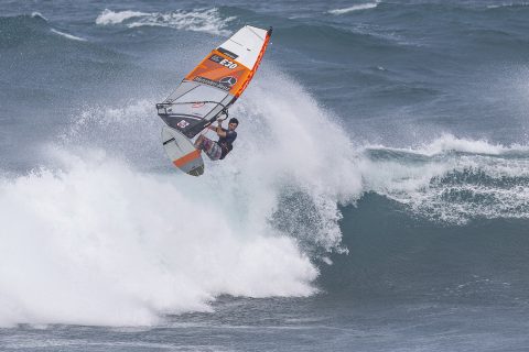 Alex flying over Ho'okipa