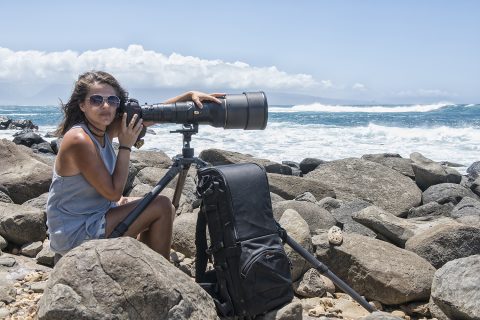 Sofie on the rocks at Ho'okipa