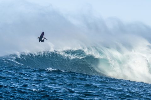 Boosting a huge air at Jaws