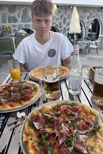 Eddie gets ready for a well deserved Pizza Is that his beer or his dads?